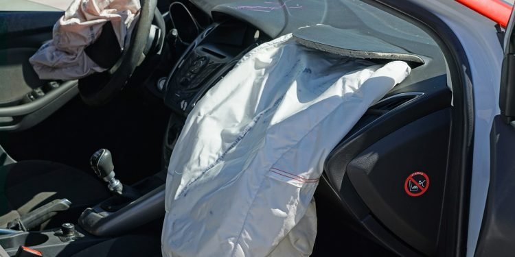 How important are airbags in improving driver safety?